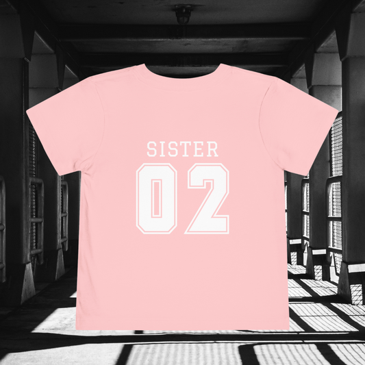 "Sister Team Heart Hands #2" Toddler Unisex Short Sleeve Tee (front and back)