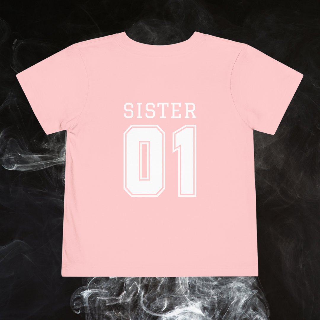 "Sister Team Heart Hands #1" Toddler Unisex Short Sleeve Tee (front and back)